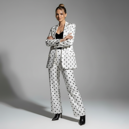 Close-up of polka dot print pattern on blazer - ARTSAY
