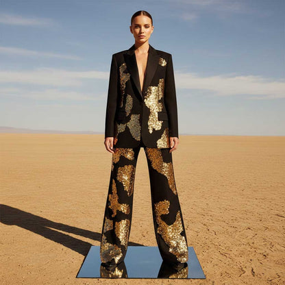 Woman wearing black sequin applique suit, styled look - ARTSAY