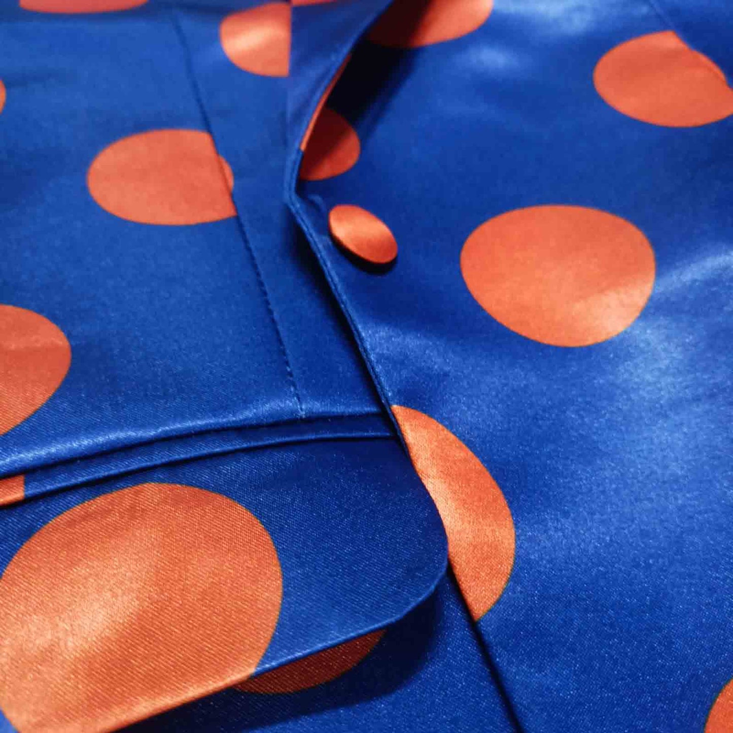 Blue and orange polka dot pant suit, side view - ARTSAY
