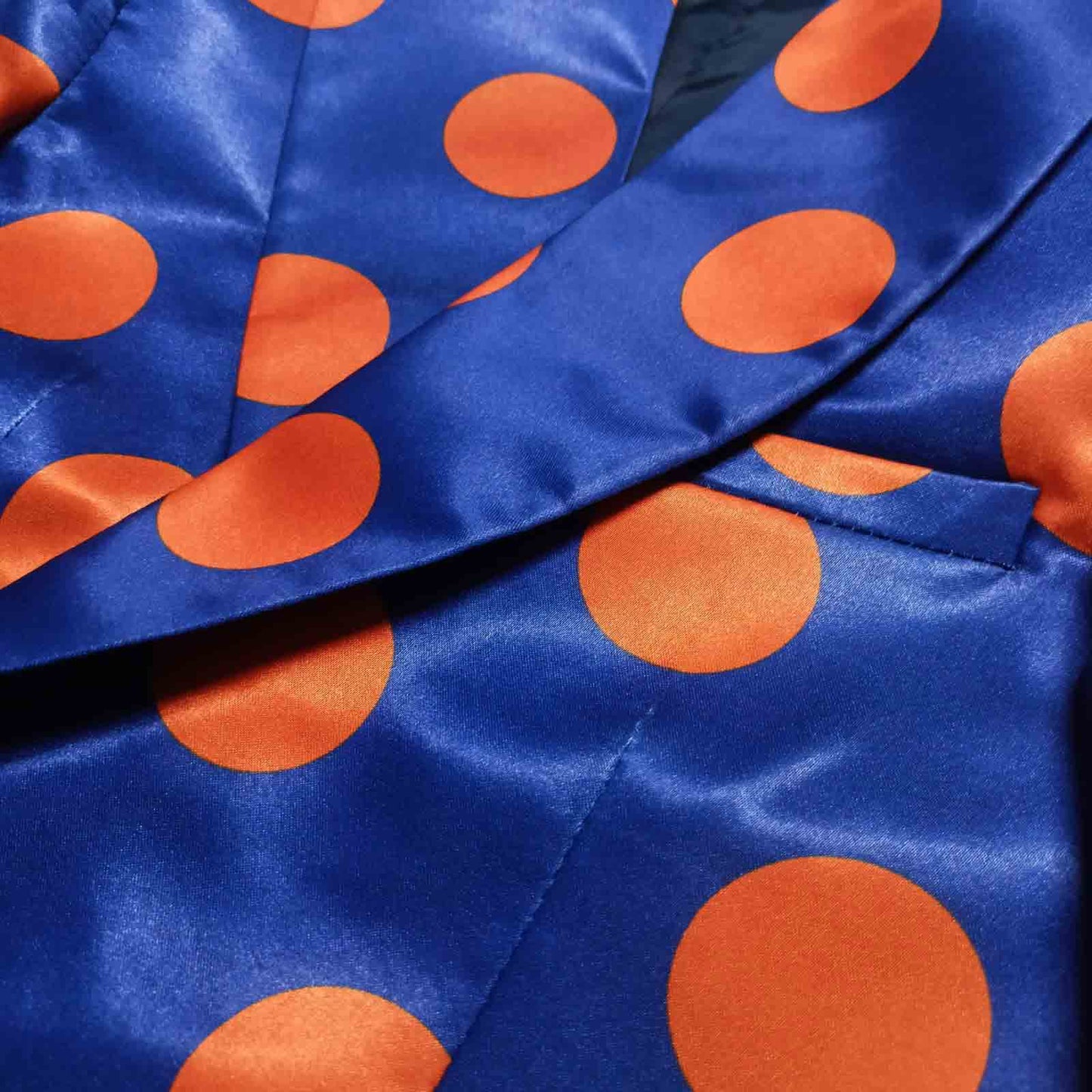 Detail shot of blue orange polka dot blazer lapel - ARTSAY
