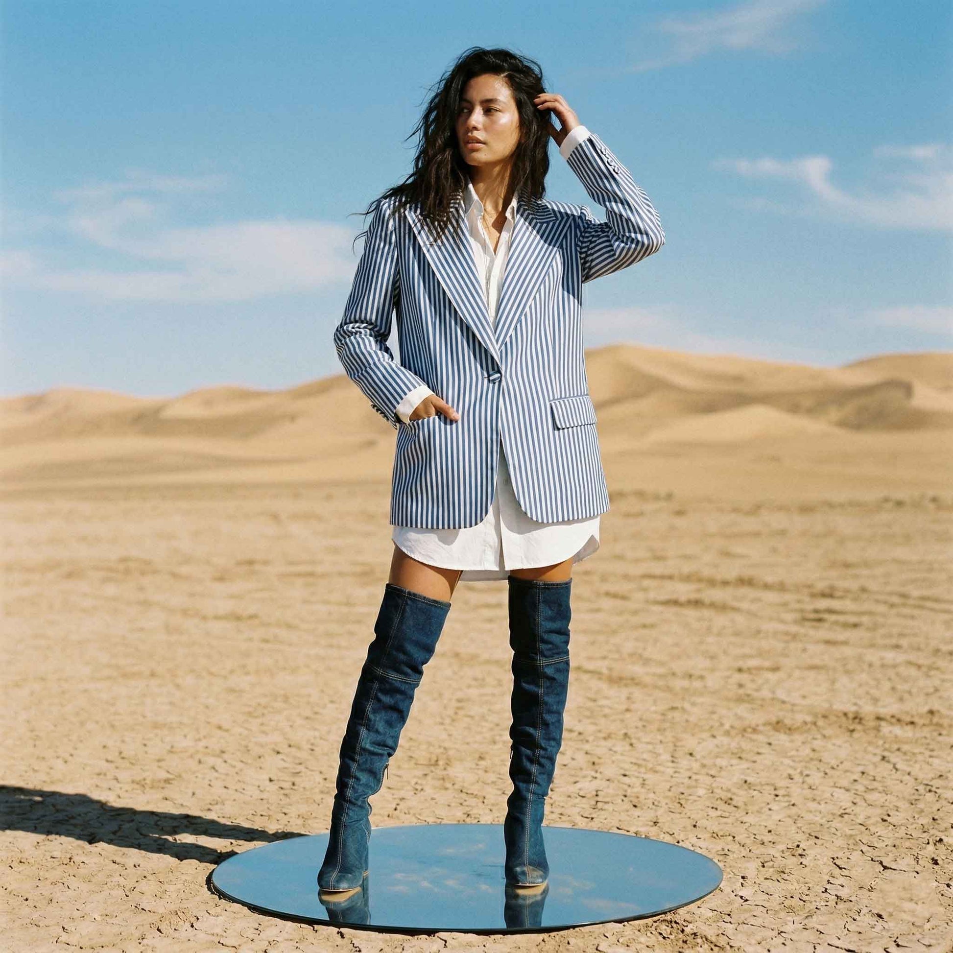 Woman wearing striped statement blazer, styled look - ARTSAY