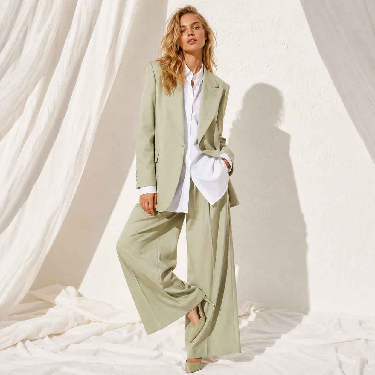 Woman wearing green linen blend suit set, styled look - ARTSAY