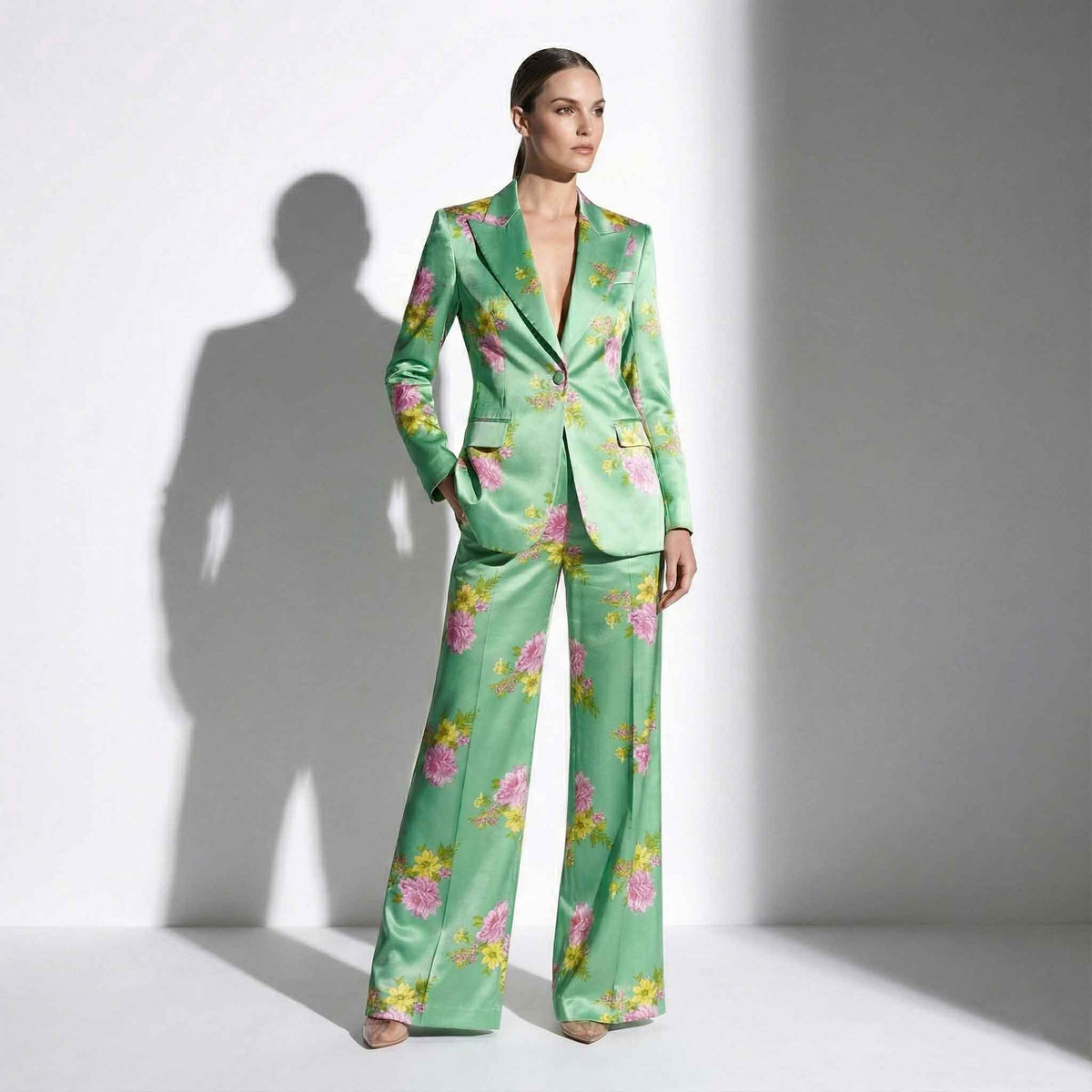 Woman wearing green floral print pant suit, styled look - ARTSAY