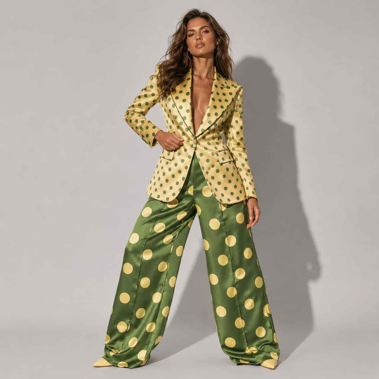 Woman wearing olive polka dot suit, styled look - ARTSAY