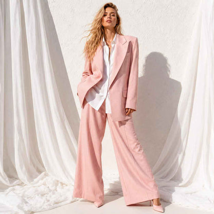 Woman wearing pink linen blend suit set, styled look - ARTSAY