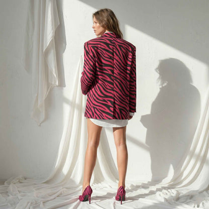 Woman wearing oversized statement blazer, styled look - ARTSAY