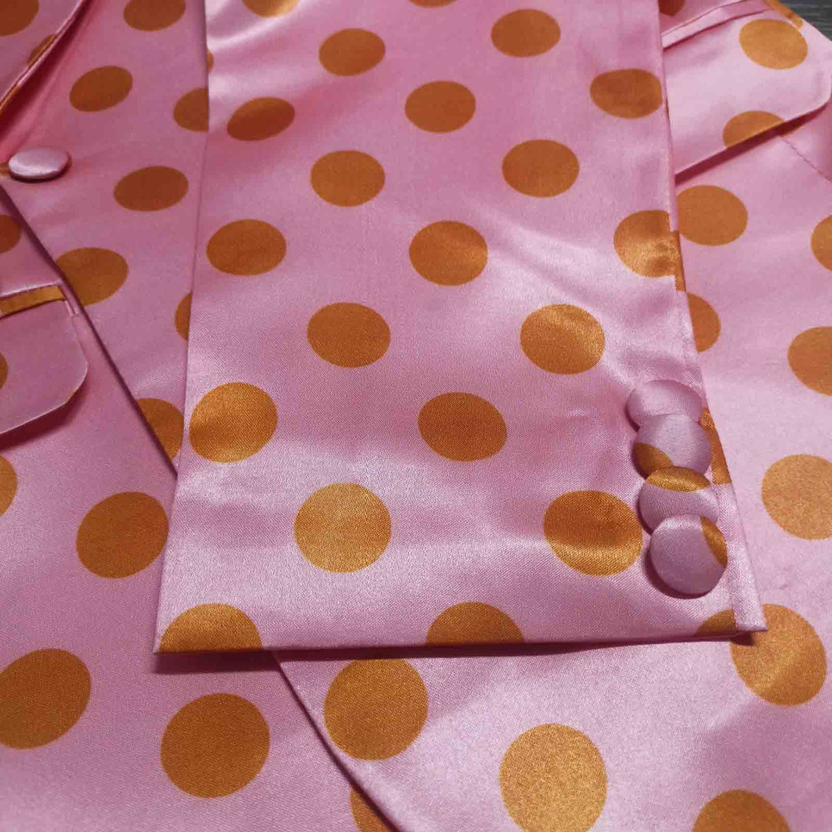 Detail shot of pink orange polka dot blazer lapel - ARTSAY