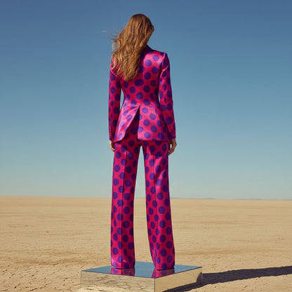 Close-up of polka dot pattern on pink blazer - ARTSAY