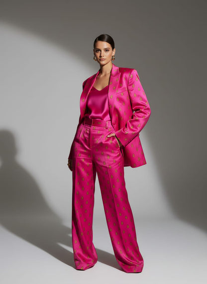 Woman wearing pink printed pant suit, styled look - ARTSAY