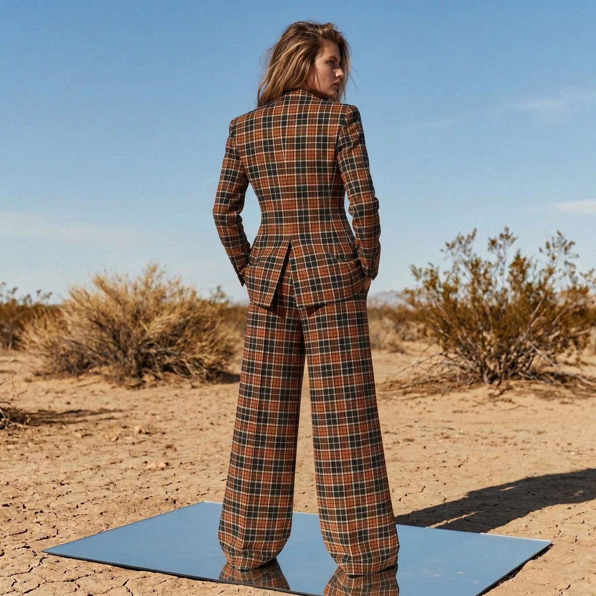 Close-up of plaid pattern on blazer - ARTSAY