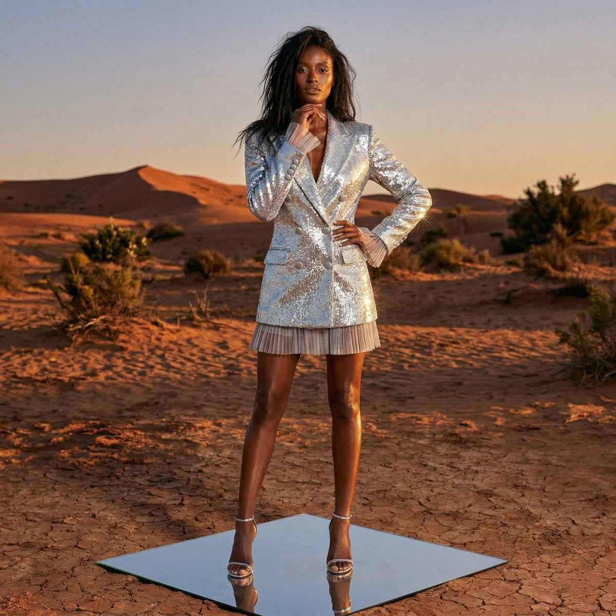 Woman wearing silver sequin blazer, styled look - ARTSAY