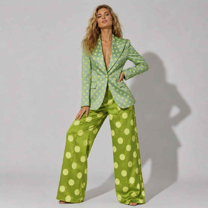 Woman wearing green polka dot suit, styled look - ARTSAY