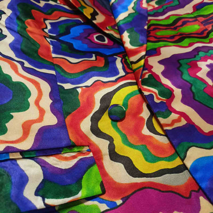 Detail shot of vibrant printed blazer lapel - ARTSAY