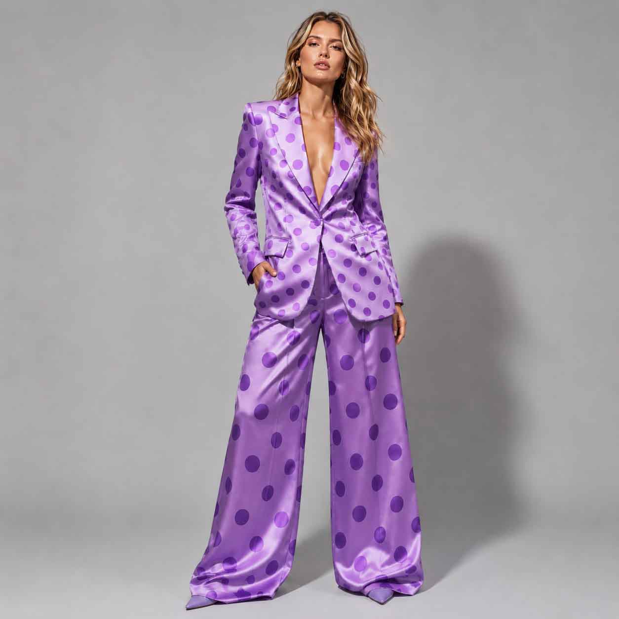 Woman wearing purple polka dot suit set, styled look - ARTSAY