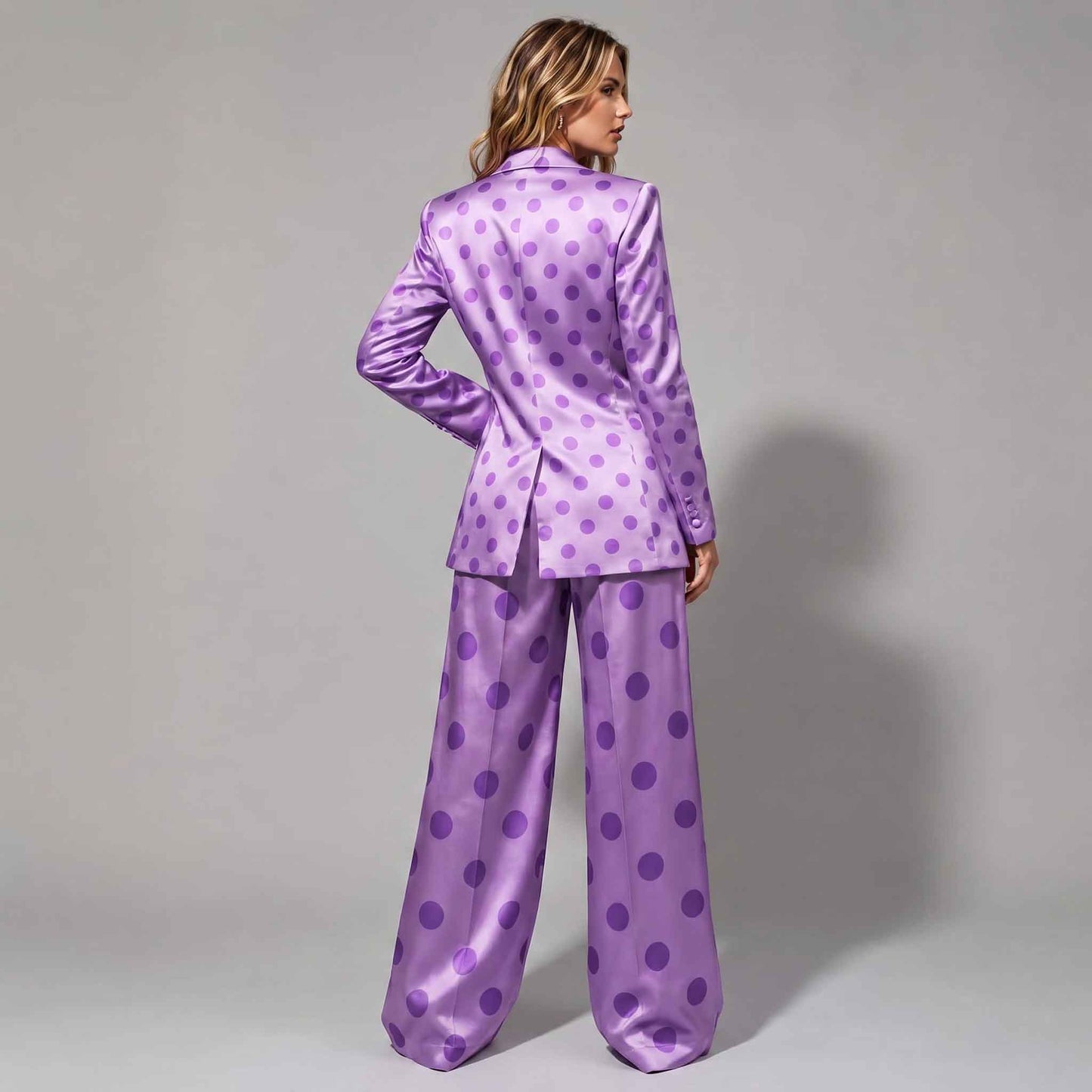 Close-up of polka dot pattern on purple blazer - ARTSAY