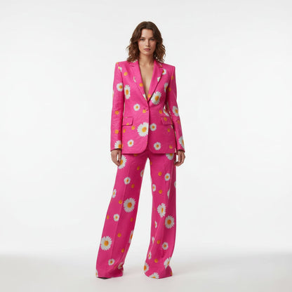 Woman wearing hot pink daisy print pant suit, styled look - ARTSAY
